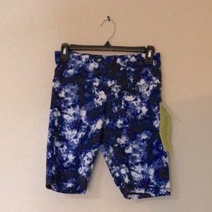 Blue,white, and black tie dyed biker shorts.